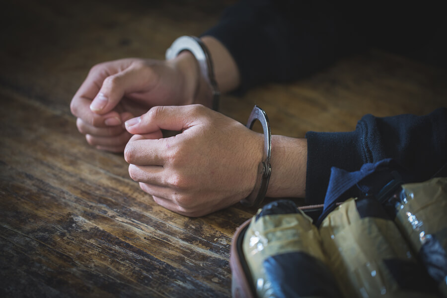 Hands in Handcuffs after a Drug Possession Conviction In Raleigh, NC?