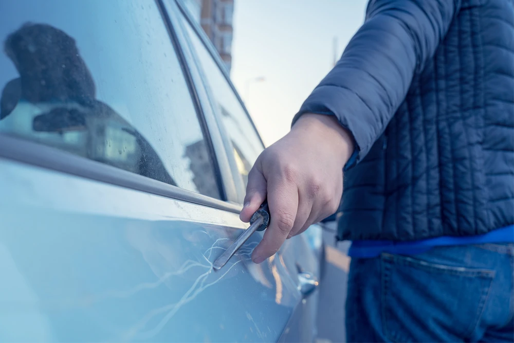 Bad-Guy-Scratching-The-Car-Door