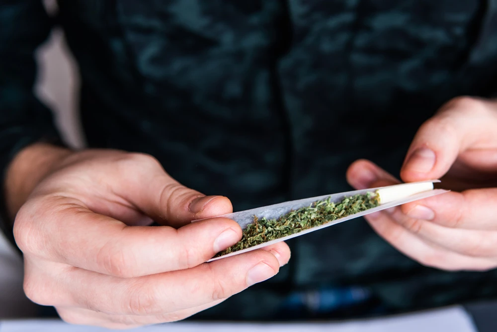 Drug-Use-Close-Up-Man-Rolling-Joint
