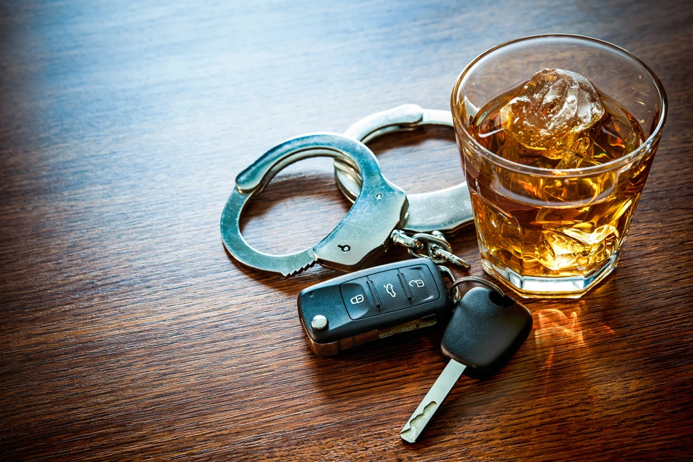 Whiskey-with-car-keys-and-handcuffs